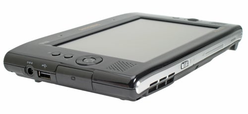 Samsung Q1 Ultra Mobile PC (UMPC) with Solid State Drive (SSD) lying on a flat surface, showing the screen, multiple ports, and control buttons.