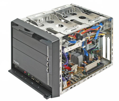 Shuttle XPC SN27P2 small form factor barebone system with side panel removed showing the interior motherboard, cables, and drive bays.