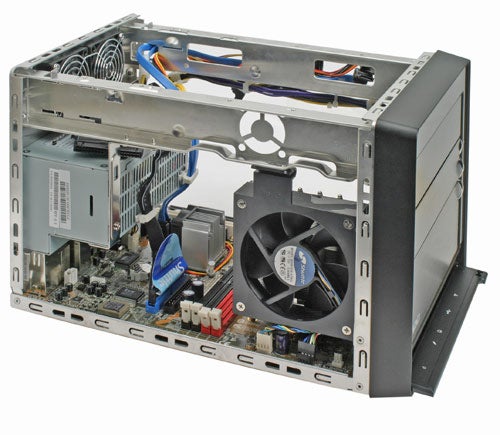 Shuttle XPC SN27P2 small form factor barebone system opened up to show internal components including motherboard, power supply, cooling fan, and expansion slots.