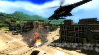 Screen capture from the video game Just Cause showing an explosion on a city street with a helicopter flying overhead.