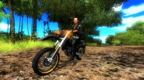 A character from the video game Just Cause sitting on a dirt bike on a muddy path with tropical vegetation in the background.