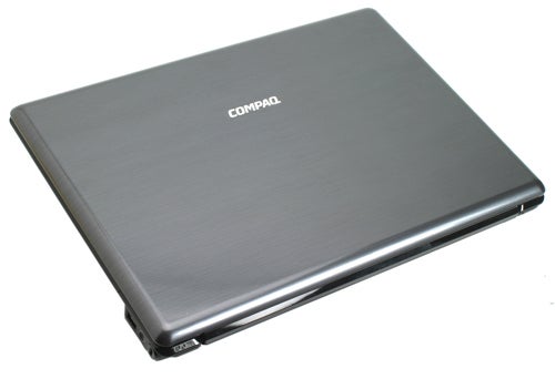 HP Compaq Presario V6000 laptop closed, showing its gray lid with Compaq logo.