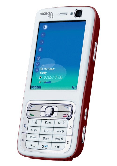 Nokia N73 mobile phone in white and red color displayed with screen showing the music player interface.