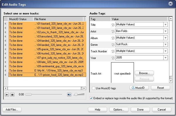 Screenshot of Roxio Easy Media Creator 9's Edit Audio Tags interface with file list and audio tag editing options visible.