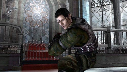 A screenshot from the video game Tekken: Dark Resurrection showing a male character in a fighting stance inside a gothic cathedral-like setting with stained glass windows in the background.