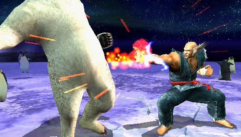 Screenshot of Tekken: Dark Resurrection showing a fight scene between a character dressed in a red and black martial arts outfit and a large white bear in a snowy arena with a fiery explosion in the background.