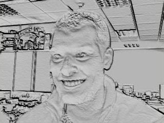 Black and white sketched effect image of a smiling man in an office environment.