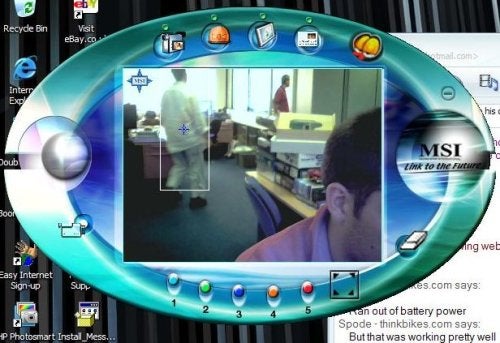 A screenshot showing the user interface of the MSI StarCam Clip webcam software, with a live video feed in a small window that features the silhouette of a person in an office setting.