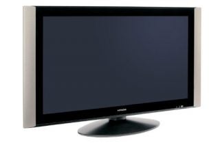 Hitachi 55PD9700 55-inch plasma TV on a stand with a blank screen and silver bezels.