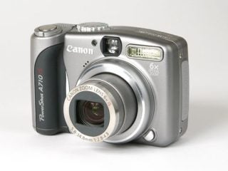 Canon PowerShot A710 IS digital camera displayed on a neutral background, featuring a 6x optical zoom lens and built-in flash.