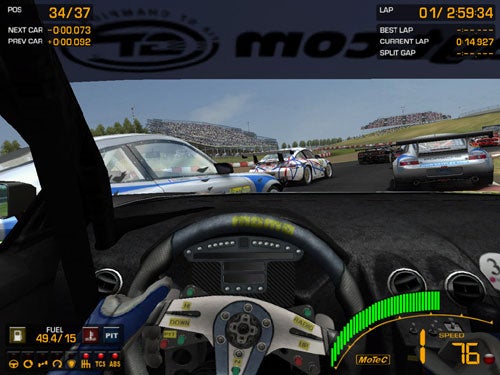 First-person perspective screenshot from the GTR 2 racing video game showing a player's view from inside a race car cockpit with other cars ahead on the track, displaying the game's HUD including position, lap time, and speedometer.