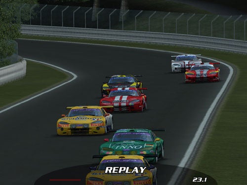 Screen capture from a GTR 2 racing game replay showing a lineup of racing cars on the track with the replay indicator visible at the bottom.