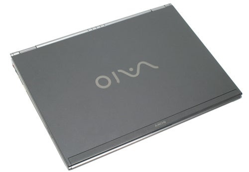 Sony Vaio VGN-SZ2XP laptop closed, showing the top cover with the VAIO logo. The laptop has a sleek silver finish and is positioned diagonally against a white background.