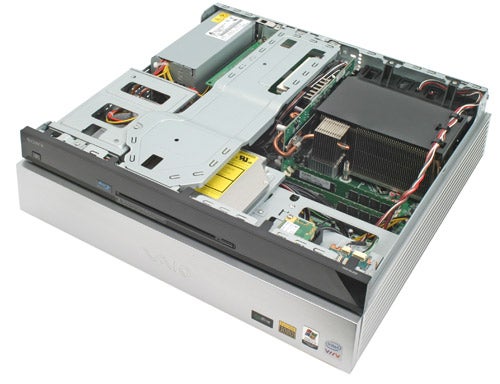 Sony Vaio VGX-XL202 Media Center PC with open case showing internal components including Blu-ray drive, cooling fan, and circuitry.