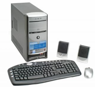 eMachines E4056 desktop computer with accompanying keyboard, mouse, and speakers on a white background.