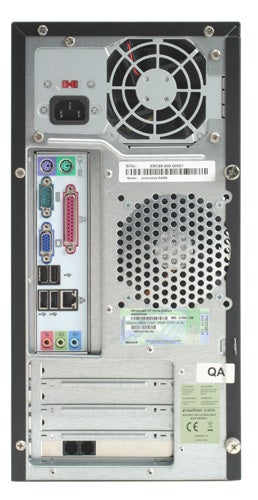 Rear view of eMachines E4056 desktop computer showing the back panel with various ports including USB, Ethernet, and audio jacks, power supply unit with fan, expansion slots, and product information sticker.