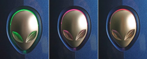 Three consecutive views of the Alienware P2 Area-51 7500 computer case's badge, displaying the iconic alien head logo with customizable LED lighting that changes from green to pink to amber.