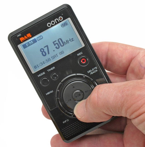 Hand holding the Oono MiniDAB One digital radio.