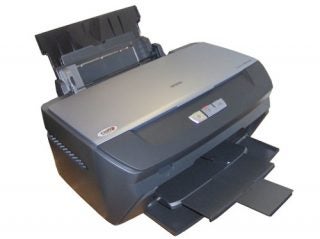 Epson Stylus Photo R265 inkjet printer with paper trays extended and top cover open.