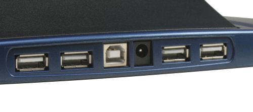 Close-up view of the side of a Port Ergostation showing its array of USB ports and connection jacks.
