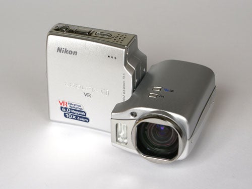 Nikon Coolpix S10 digital camera with swivel lens design displayed on a neutral background, featuring a 10x optical zoom and 6.0 megapixels.