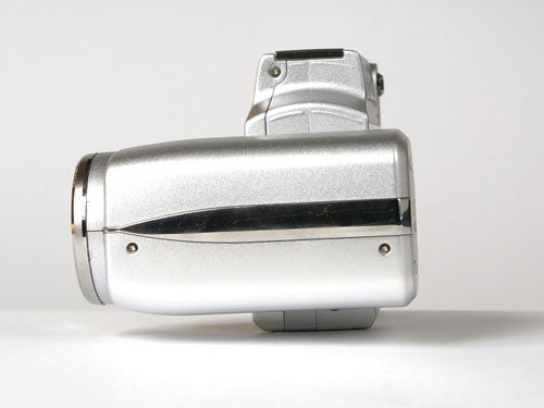 Nikon Coolpix S10 digital camera displayed on a white background, showing its side and swivel lens design.