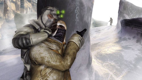 Screenshot from the video game 'Splinter Cell: Double Agent' featuring the main character in a stealth pose, holding an enemy in a chokehold with a snowy landscape and another character in the background.