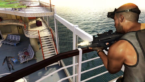 In-game screenshot from Splinter Cell: Double Agent showing a character aiming a gun with a suppressor from an elevated position on a ship deck with an enemy lying on the ground below, indicating stealth and action gameplay elements.