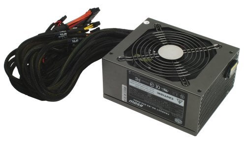 A power supply unit with black cables on a white background.