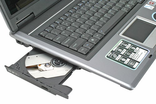 Asus F3JP Core 2 Duo Notebook with an open DVD drive showcasing its design and connectivity options.