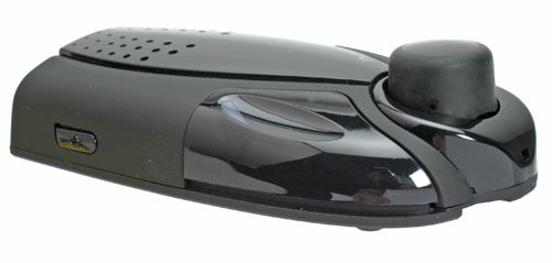 A black Parrot Minikit Bluetooth speakerphone device with buttons and speaker grill visible on a white background.