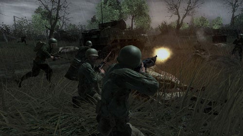 Screenshot of gameplay from Call of Duty 3 showing soldiers in combat with one firing a weapon with muzzle flash visible.