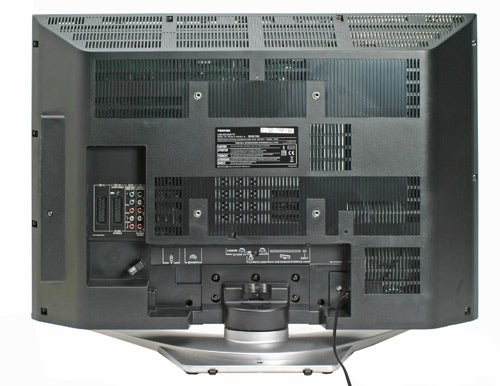 Back view of a Toshiba Regza 32WLT68 32-inch LCD TV showing various ports, labels, and the stand.