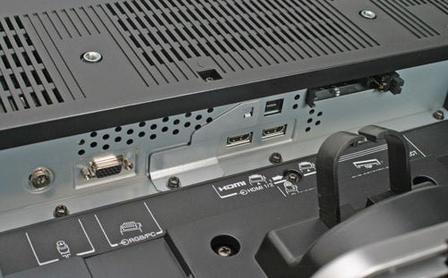 Close-up view of the Toshiba Regza 32WLT68 32-inch LCD TV's input panel, showing HDMI, VGA, and other connectivity ports.