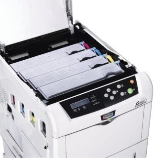 Kyocera Mita FS-C5015N printer with open top cover showing paper tray and internal color toner cartridges.