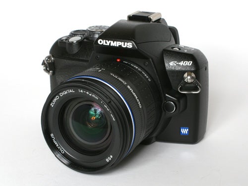 Olympus E-400 DSLR camera with Zuiko Digital 14-42mm lens displayed on a white background.