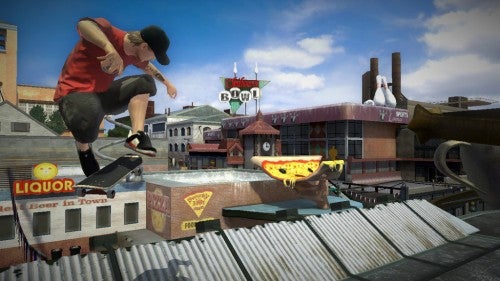 A screenshot from Tony Hawk's Project 8 on Xbox 360 showing an animated skateboarder performing a trick mid-air above an urban park with buildings in the background, highlighting the game's graphics and action gameplay.