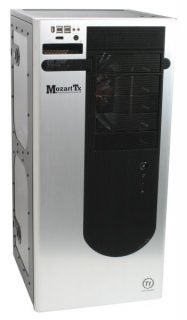 Thermaltake Mozart TX computer case in silver with black front panel, featuring a 7-inch display, multiple drive bays, and the Thermaltake logo.