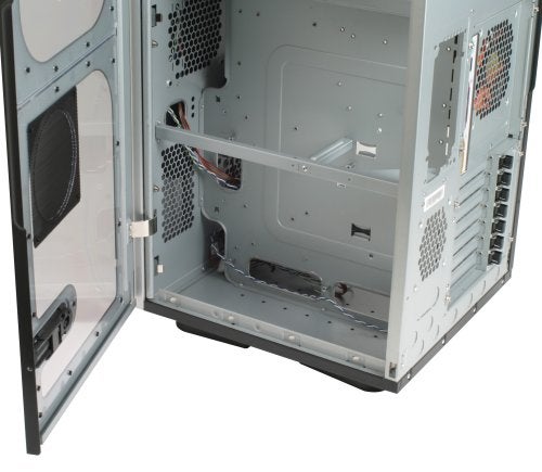 Open side view of a Thermaltake Mozart TX computer case showing the internal compartments and mounting slots for hardware components.