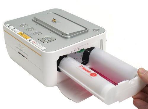 Kodak G600 Printer Dock with paper cartridge being inserted into the side of the printer.