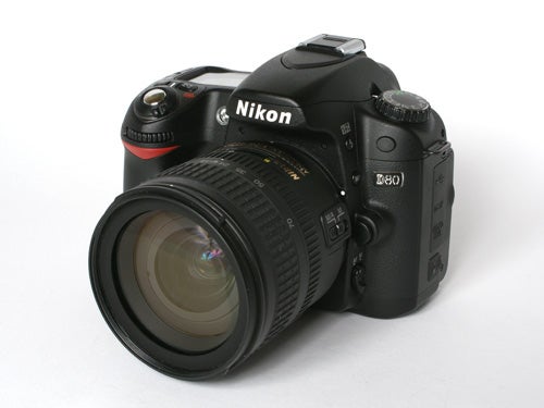 Nikon D80 10MP Digital SLR camera with a lens attached, photographed on a white background.