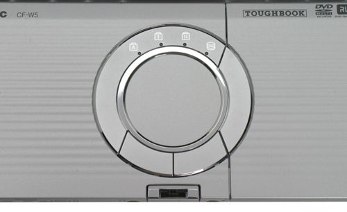 Close-up of a Panasonic ToughBook CF-W5 laptop's circular trackpad and volume control with the DVD drive and ToughBook logo visible.