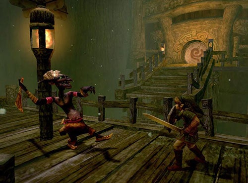 Screenshot from The Legend of Zelda: Twilight Princess video game showing the protagonist, Link, in combat with a lizard-like enemy in a torch-lit temple environment.