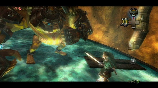 Screenshot from 'The Legend of Zelda: Twilight Princess' video game showing the protagonist Link in a battle stance facing a large armored enemy in a cavernous environment, with in-game display showing health and rupee count.