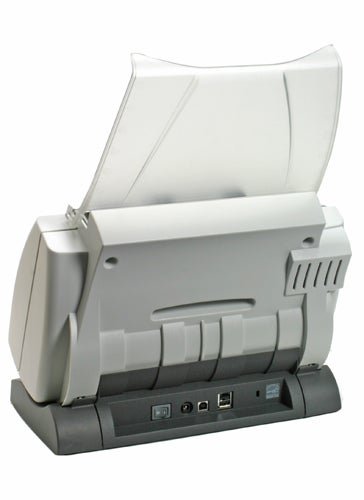 Kodak i1220 scanner with the document feeder tray open, showing the input and output areas, along with the control buttons and USB connectivity ports.