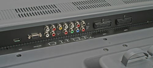Close-up view of the input and output ports on the back panel of an Atec AV371DS 37-inch LCD TV, including HDMI, component, and VGA connections.