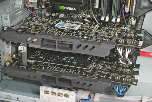 Interior view of Alienware Area-51 7500 computer showing two NVIDIA graphics cards configured in SLI, with surrounding components and cables.