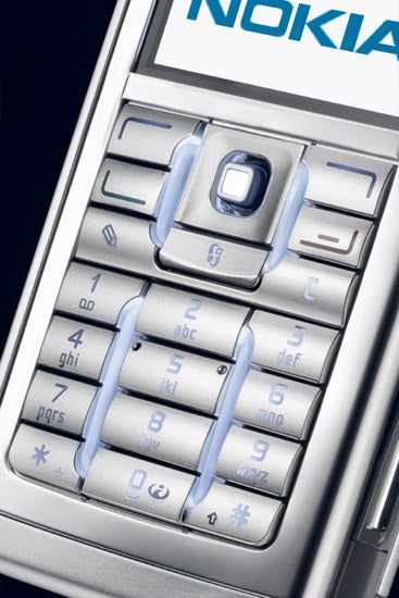 Close-up of a Nokia E60 mobile phone focusing on the keypad and navigation buttons.