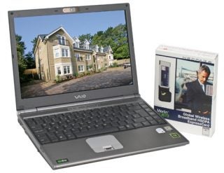 Sony Vaio VGN-SZ3XP laptop displayed open with screen showing a desktop wallpaper, alongside its packaging for a Global Wireless Broadband HSDPA ExpressCard.