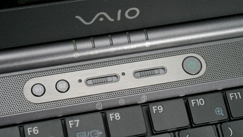 Close-up of Sony Vaio VGN-SZ3XP laptop's hinge area showing power button, shortcut keys, and part of the keyboard.